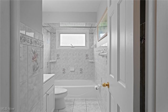 12610 Woodward Blvd, Garfield Heights, OH 44125 - bathroom featuring washtub / shower combination, vanity, and tile patterned flooring