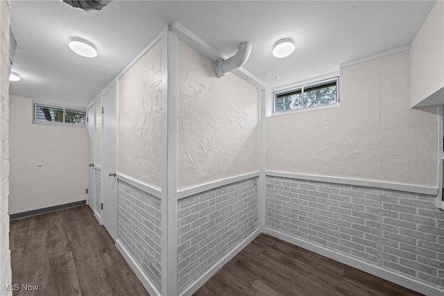 12610 Woodward Blvd, Garfield Heights, OH 44125 - basement featuring dark wood-type flooring and a textured wall