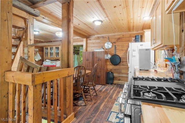 30101 Friendly Ridge Rd, Freeport, OH 43973 - kitchen featuring stainless steel gas range oven, wood ceiling, wood walls, dark wood-style flooring, and dark countertops