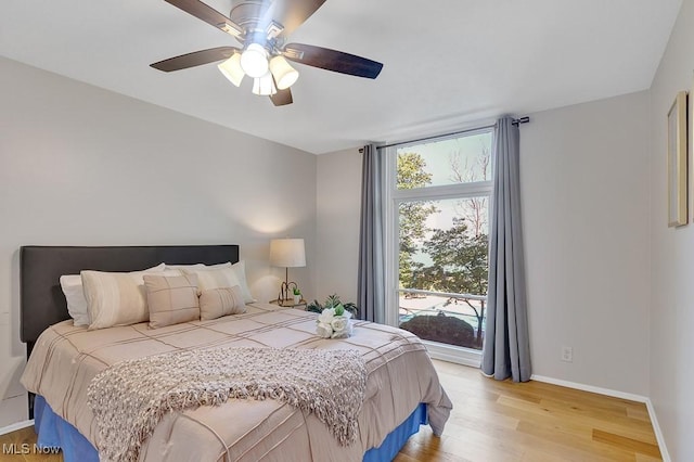 25801 Lake Shore Blvd Unit 28, Euclid, OH 44132 - bedroom with light wood finished floors and ceiling fan