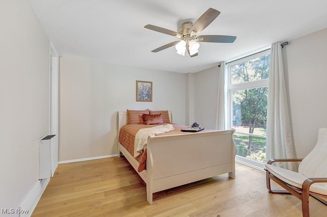 25801 Lake Shore Blvd Unit 28, Euclid, OH 44132 - bedroom featuring light wood-type flooring and ceiling fan