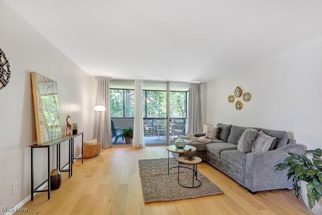25801 Lake Shore Blvd Unit 28, Euclid, OH 44132 - living area with wood finished floors and expansive windows