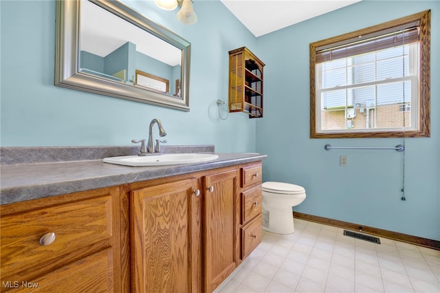 1550 Rebel St SW, Canton, OH 44706 - bathroom featuring toilet and vanity