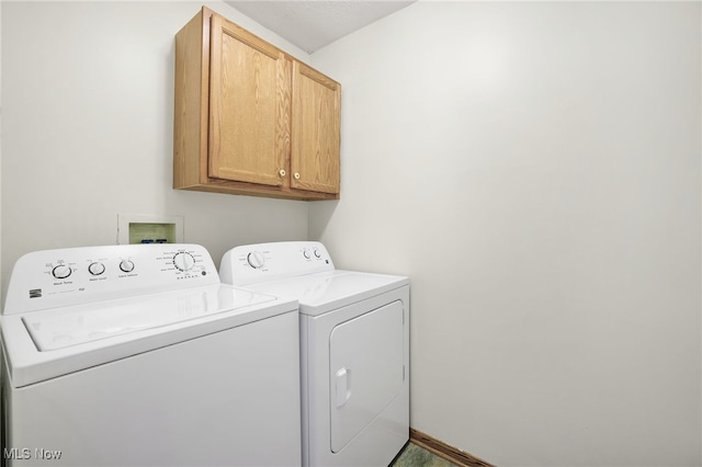 1550 Rebel St SW, Canton, OH 44706 - washroom with cabinet space and independent washer and dryer