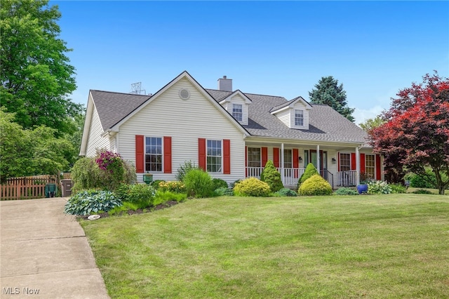 1550 Rebel St SW, Canton, OH 44706 - cape cod house featuring covered porch, a chimney, and a shingled roof