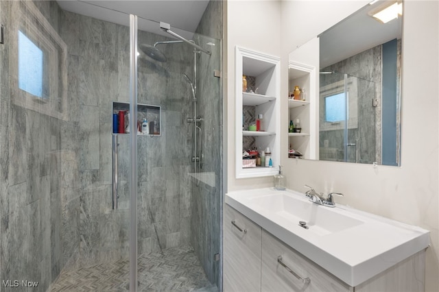 6190 Fitch Rd, North Olmsted, OH 44070 - bathroom featuring a shower stall, vanity, and healthy amount of natural light