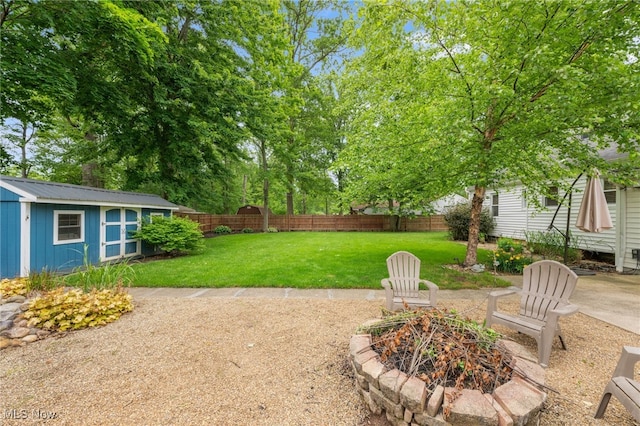 6190 Fitch Rd, North Olmsted, OH 44070 - fenced backyard with an outdoor structure and a patio area