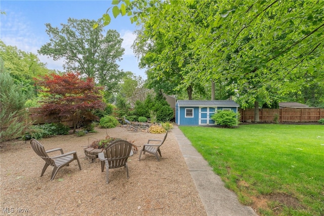 6190 Fitch Rd, North Olmsted, OH 44070 - view of yard featuring an outbuilding and an outdoor fire pit