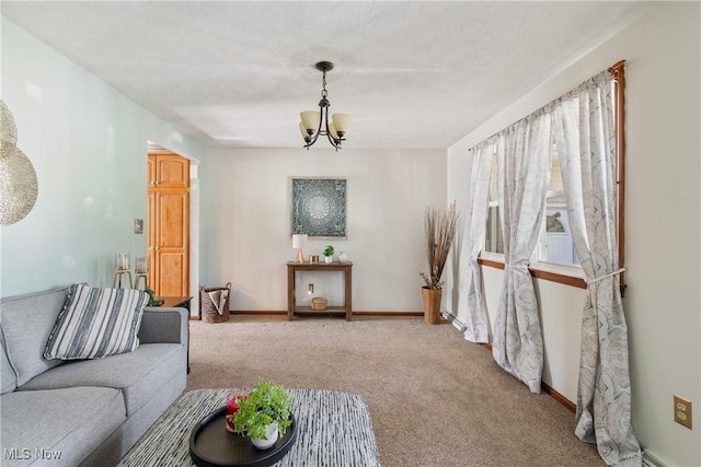 578 25th St NW, Massillon, OH 44647 - carpeted living room with a chandelier and baseboards