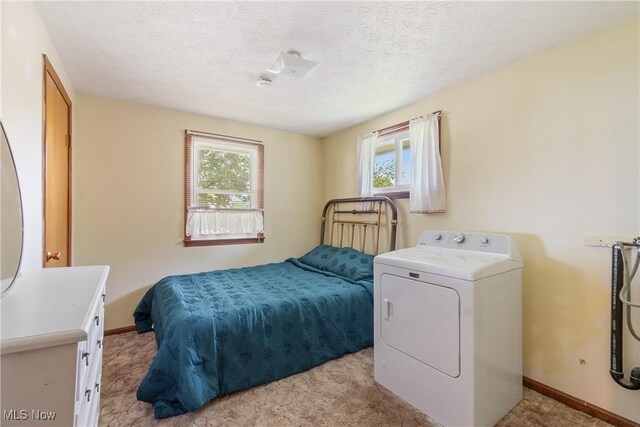578 25th St NW, Massillon, OH 44647 - bedroom featuring light colored carpet and a textured ceiling