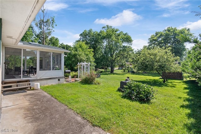 578 25th St NW, Massillon, OH 44647 - view of green lawn featuring a sunroom