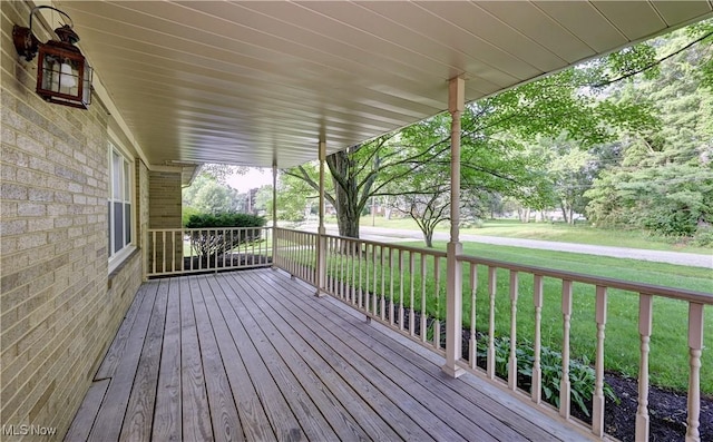 8171 Pheasant Ave NW, North Canton, OH 44720 - wooden deck with a yard