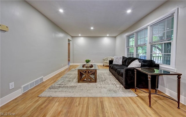 8171 Pheasant Ave NW, North Canton, OH 44720 - living area featuring wood finished floors and recessed lighting