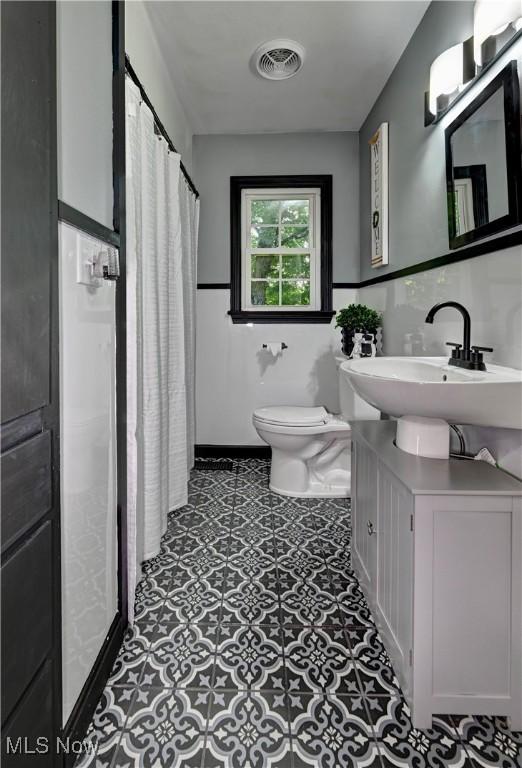8171 Pheasant Ave NW, North Canton, OH 44720 - full bathroom with vanity and a stall shower