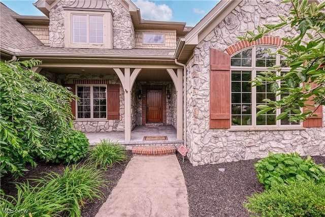 8309 Gentry St NW, Massillon, OH 44646 - entrance to property featuring stone siding and a porch