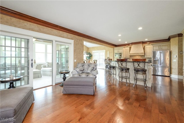 8309 Gentry St NW, Massillon, OH 44646 - living room with ornamental molding, hardwood / wood-style floors, and recessed lighting