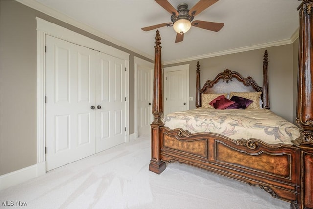 8309 Gentry St NW, Massillon, OH 44646 - bedroom featuring light carpet, ceiling fan, ornamental molding, and a closet
