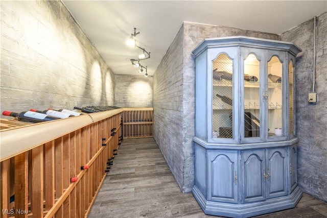 8309 Gentry St NW, Massillon, OH 44646 - wine cellar featuring wood finished floors and track lighting