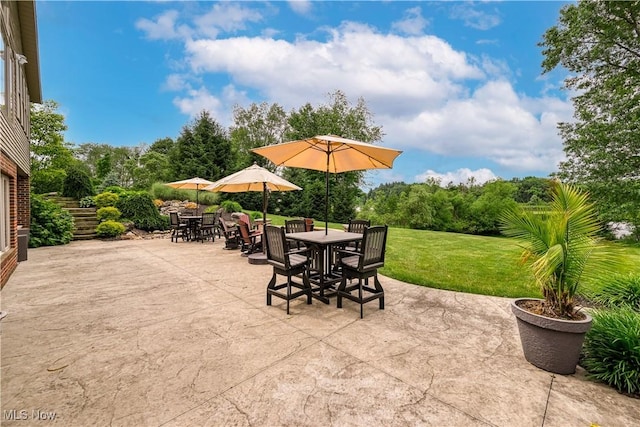 8309 Gentry St NW, Massillon, OH 44646 - view of patio featuring outdoor dining area