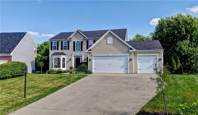 2720 Pinegate Dr, Norton, OH 44203 - colonial house with a garage, driveway, and a front lawn