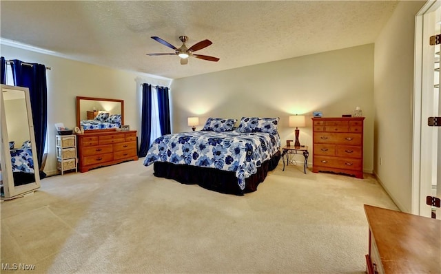 2720 Pinegate Dr, Norton, OH 44203 - carpeted bedroom with ceiling fan and a textured ceiling