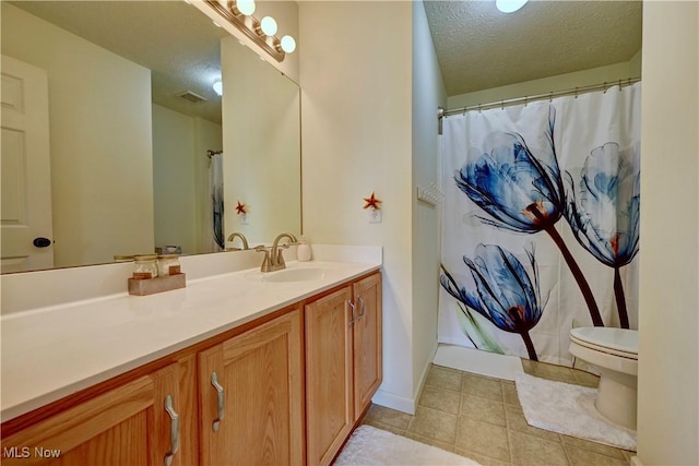 2720 Pinegate Dr, Norton, OH 44203 - full bath with vanity, a textured ceiling, tile patterned floors, and a shower with curtain
