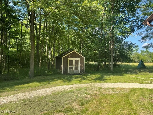5450 King Graves Rd, Vienna, OH 44473 - view of green lawn featuring a storage unit