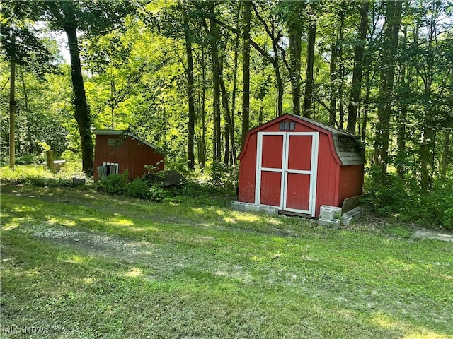 5450 King Graves Rd, Vienna, OH 44473 - view of shed with a forest view