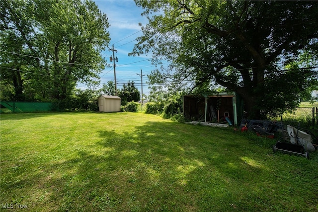 8218 Westmoor Rd, Mentor, OH 44060 - view of yard featuring a storage unit