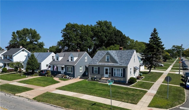 5711 W 54th St, Parma, OH 44129 - view of front of property with a front yard