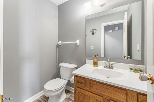 1234 W Maple St, North Canton, OH 44720 - bathroom with toilet and vanity