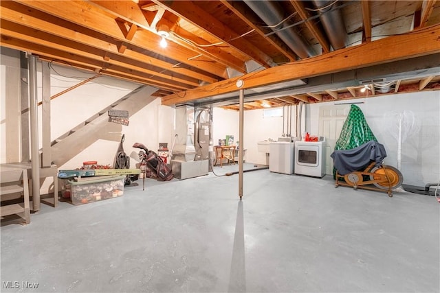 1234 W Maple St, North Canton, OH 44720 - unfinished below grade area featuring separate washer and dryer and stairway