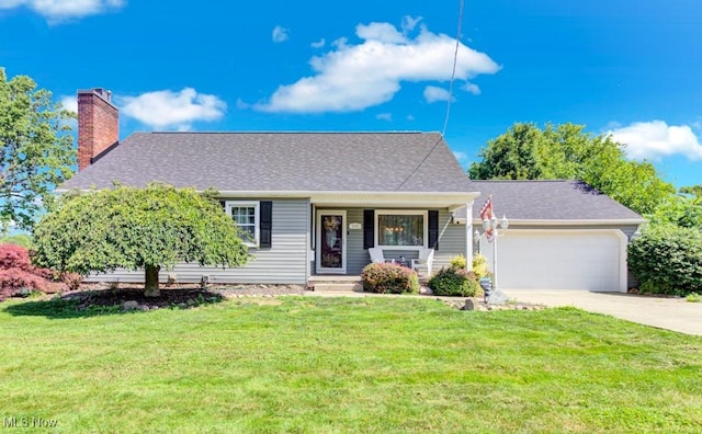 201 Noble St W, East Canton, OH 44730 - view of front of house featuring an attached garage, a front lawn, concrete driveway, and a chimney