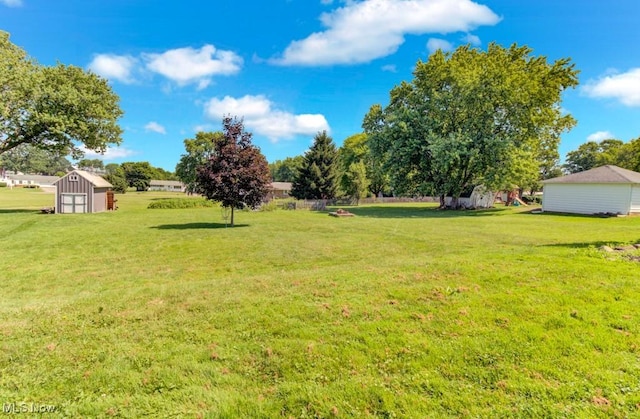 201 Noble St W, East Canton, OH 44730 - view of grassy yard with a shed