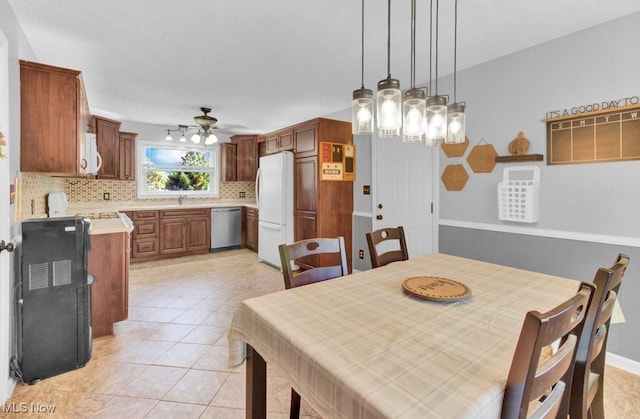 201 Noble St W, East Canton, OH 44730 - dining room featuring a chandelier, ceiling fan, and light tile patterned flooring