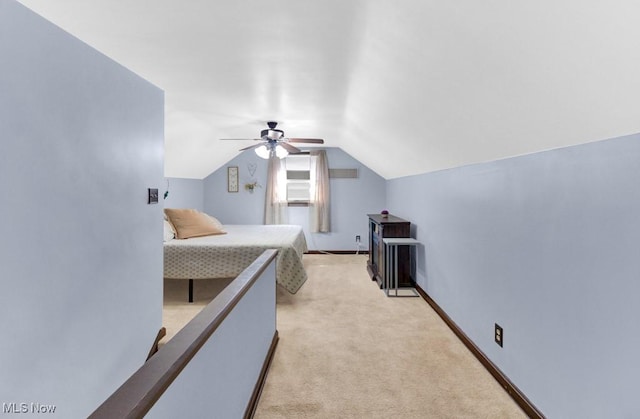 201 Noble St W, East Canton, OH 44730 - bedroom featuring vaulted ceiling, light carpet, and a ceiling fan