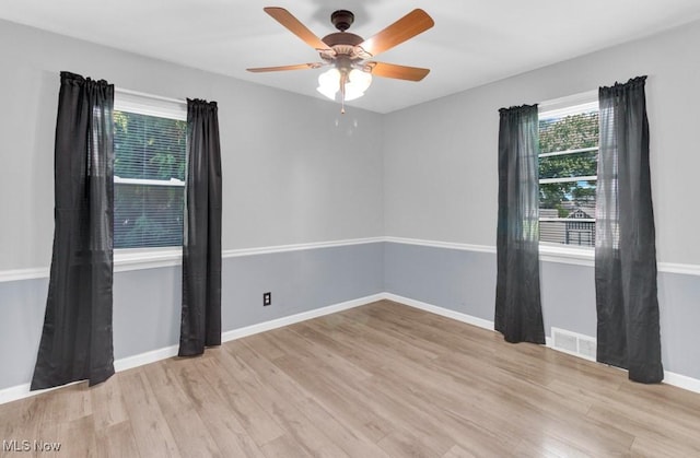 201 Noble St W, East Canton, OH 44730 - unfurnished room with wood finished floors and a ceiling fan