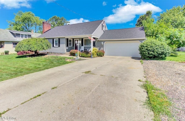 201 Noble St W, East Canton, OH 44730 - view of front of home with an attached garage, covered porch, concrete driveway, a front lawn, and a chimney