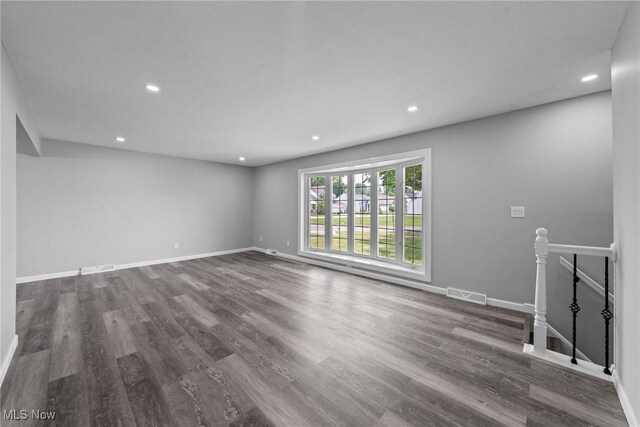 1303 E Dartmoor Ave, Seven Hills, OH 44131 - unfurnished living room featuring recessed lighting and wood finished floors