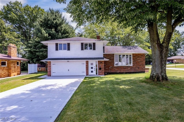 1303 E Dartmoor Ave, Seven Hills, OH 44131 - split level home featuring a garage, concrete driveway, and a front lawn