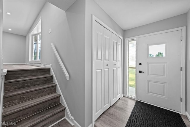 1303 E Dartmoor Ave, Seven Hills, OH 44131 - entryway with wood finished floors, stairway, and recessed lighting