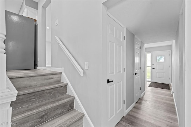1303 E Dartmoor Ave, Seven Hills, OH 44131 - stairs featuring wood finished floors