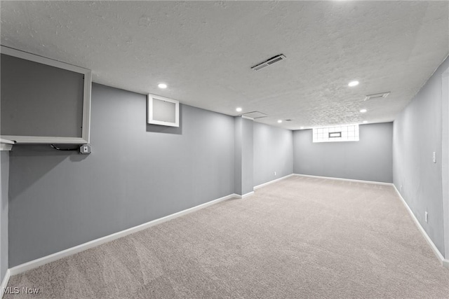 1303 E Dartmoor Ave, Seven Hills, OH 44131 - below grade area with a textured ceiling, carpet floors, and recessed lighting