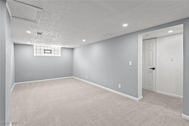 1303 E Dartmoor Ave, Seven Hills, OH 44131 - basement with carpet, a textured ceiling, and recessed lighting