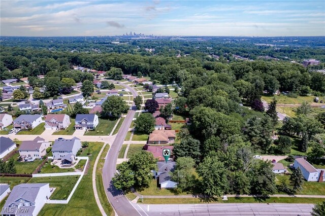 1303 E Dartmoor Ave, Seven Hills, OH 44131 - aerial view of residential area featuring a forest
