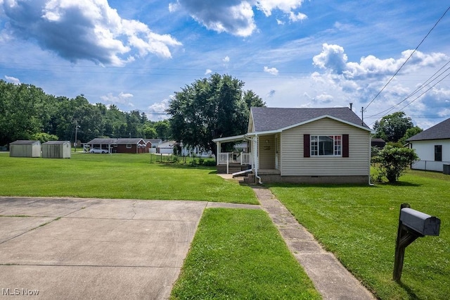 1320 21st St, Vienna, WV 26105 - view of front facade featuring a front lawn, a porch, and crawl space