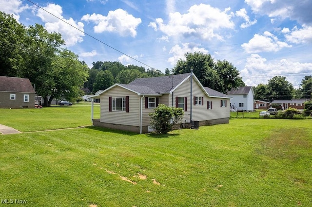 1320 21st St, Vienna, WV 26105 - view of property exterior featuring crawl space and a lawn