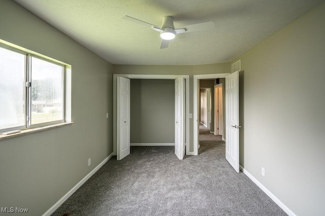 1320 21st St, Vienna, WV 26105 - unfurnished bedroom featuring carpet, ceiling fan, and a closet