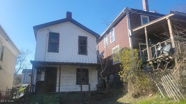 918 Florence St, East Liverpool, OH 43920 - rear view of house with a chimney and covered porch