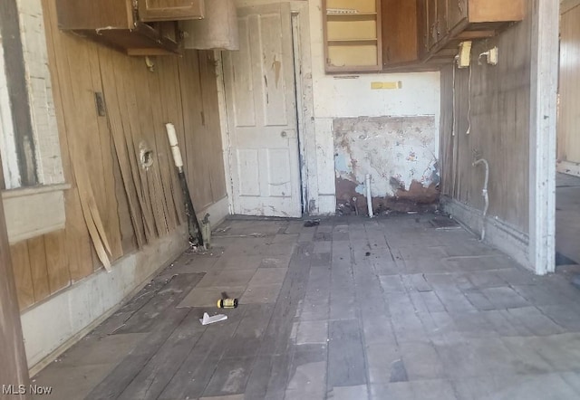 918 Florence St, East Liverpool, OH 43920 - kitchen featuring wooden walls and brown cabinetry